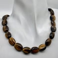 thumbnail image 5 of Wildly Exotic Tigereye Oval Coin Bead 8 inch Strand | 16x12x6mm | 13 Beads |, 5 of 7