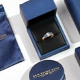 thumbnail image 5 of Gem Stone King 18K Rose Gold Plated Silver 3-Stone Ring Oval White Created Sapphire and Vivid Persian Blue Moissanite (2.12 Cttw, Size 9), 5 of 6
