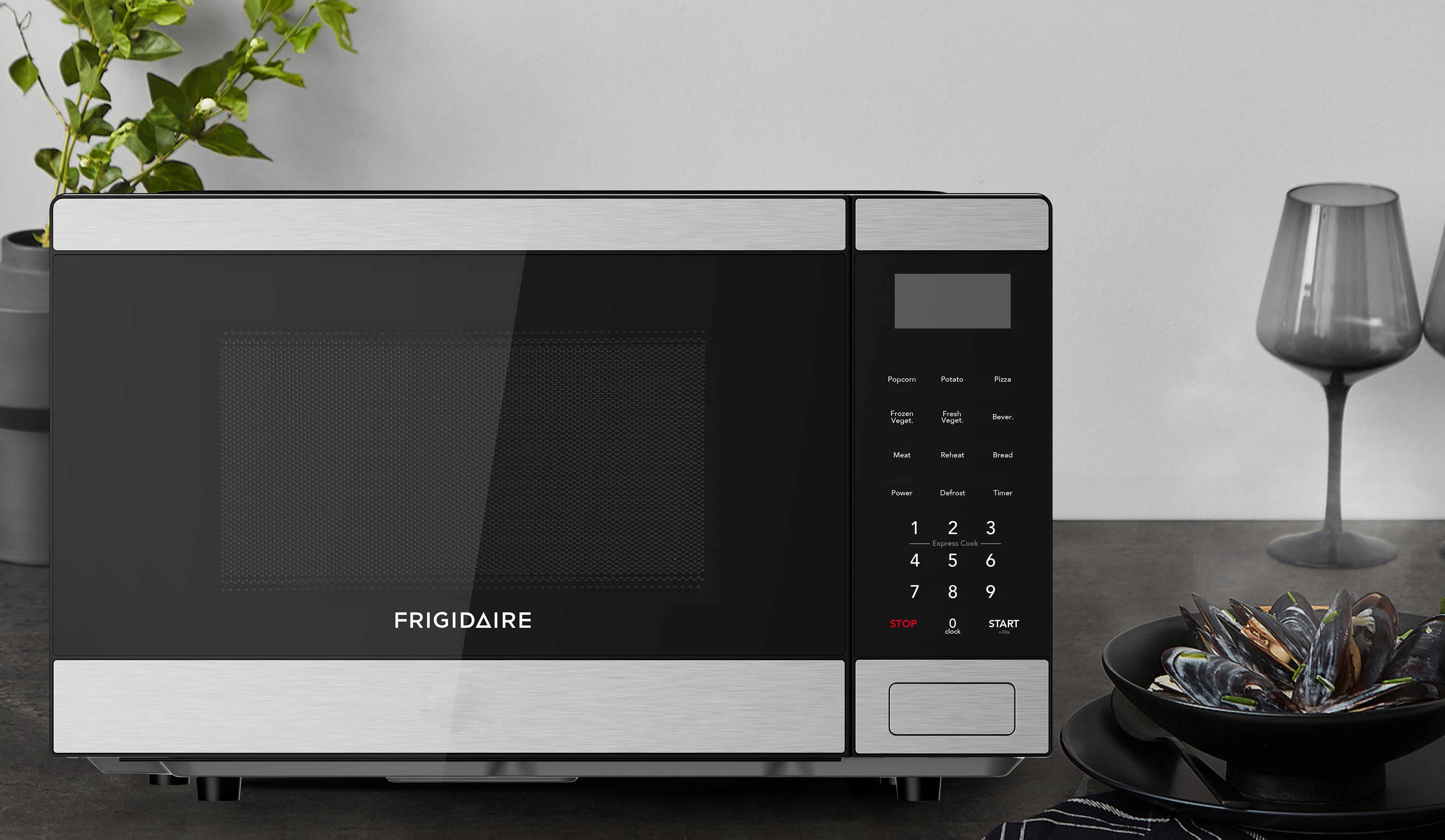 Frigidaire 0.9 Cu. Ft. Countertop Microwave Oven, 1000 Watt Microwave with 10 Power Levels, Stainless Steel