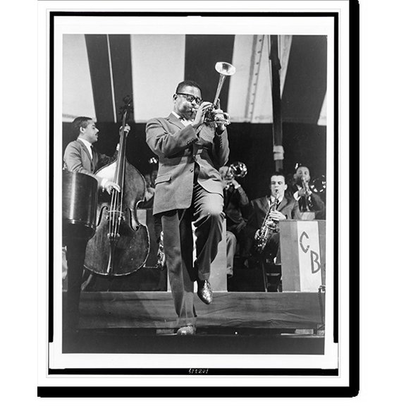 Historic Print, [Jazzman Dizzy Gillespie, full-length, standing, facing right, playing horn on stage], 16" x 20"