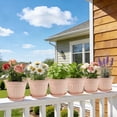 thumbnail image 6 of FIASON 6 Pack 10 Inch Pink Embossed Plastic Plant Pots with Vine Patterns, Drainage Holes and Matching Saucers, Decorative Flower Planters for Indoor Outdoor Garden Patio Home Office Decor, 6 of 8