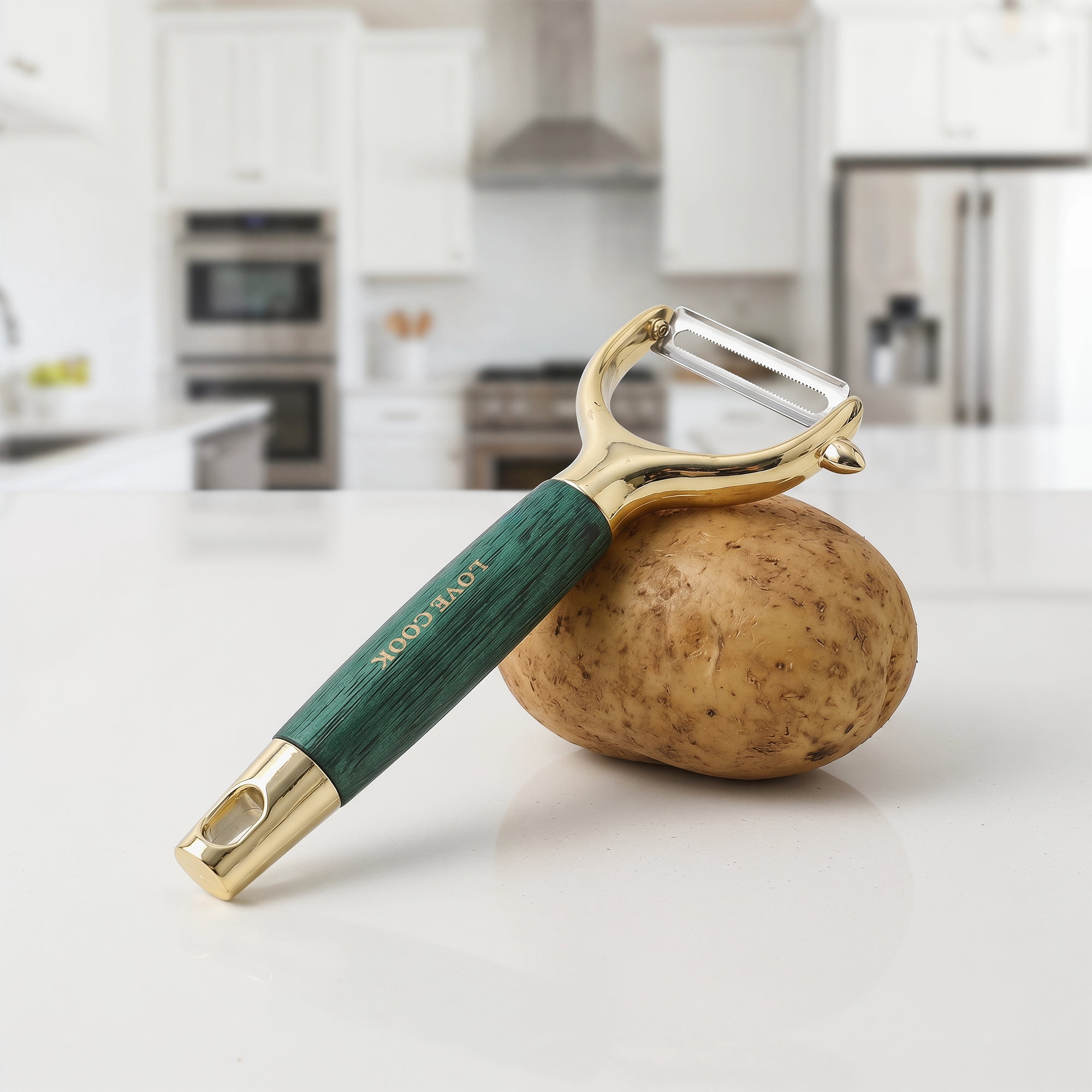 Unique Bargains Stainless Steel Ergonomic Peeler with Hang Handle Gold-1 6.6" x 2.8"