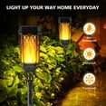 thumbnail image 4 of Outdoor Solar Lights, 4 Pack LED Waterproof Solar Garden Lights with Flickering Flame, Outside Lighting Decoration for Patio Garden Yard Pathway Landscape, 4 of 8