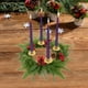 thumbnail image 1 of Corona navideña con velas y portavelas | Decoración navideña de PVC para mesa, repisa y ventana | Centro de mesa festivo verde y dorado con cascabeles y lazos, 1 of 6