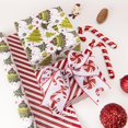 thumbnail image 4 of Papel de regalo Ribbli, reversible, con forma de árbol de Navidad y rayas rojas y blancas, 17 pulgadas x 33 pies por rollo, 4 of 5
