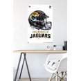 thumbnail image 6 of NFL JacksonVille Jaguars - Drip Helmet 20 Wall Poster with Push Pins, 22.375" x 34", 6 of 6