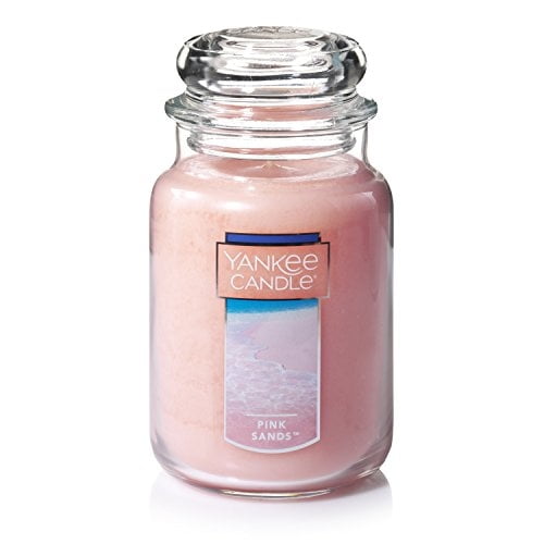 yankee candle large jar candle pink sands yankee candle yankee candle Rosado vela de tarro grande Yankee Candle, vista frontal con tapa de vidrio, cera rosada uniforme y etiqueta frontal con logo y texto "Pink Sands"; adecuada para decoración y ambientación de interiores.