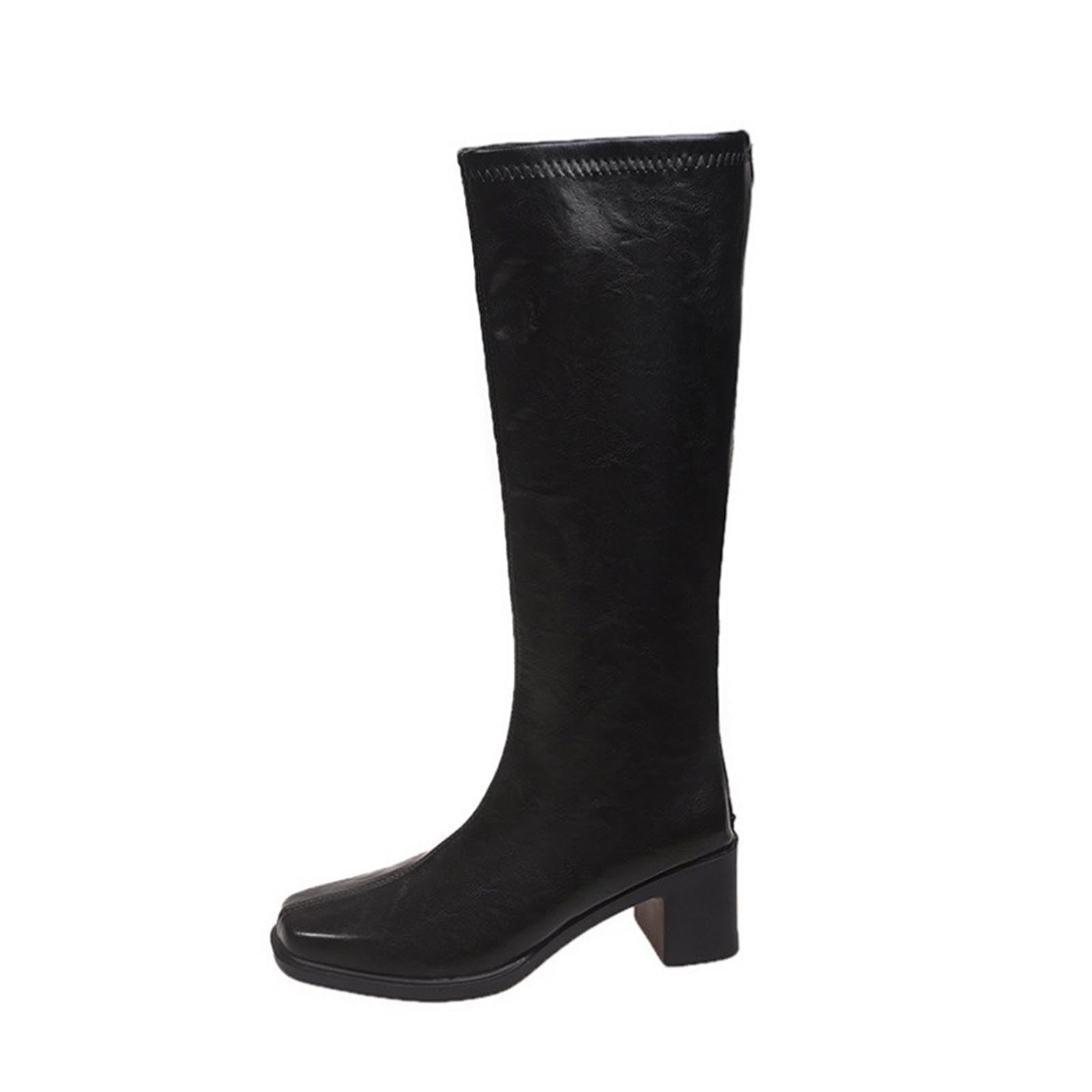 Black Elegant Boots With Robust Heel And Sleek Design For A Sophisticated Winter Outfit Choice
