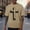 04 Khaki, variant on YueHuiYing Men's Easter Graphic T-Shirt Funny Bunny Egg Hunt Print Casual Short Sleeve Crew Neck Stretch Activewear Tee Navy L