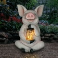 thumbnail image 2 of Exhart Solar Pig Garden Statue Holding a Glass Jar with Eight LED Firefly String Lights, 7 by 10.5 inches, Resin, Multicolor, 2 of 8