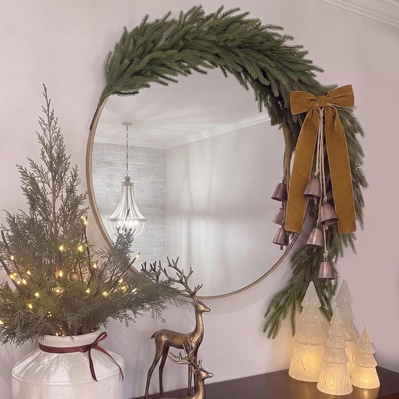 Guvpev 4FT Artificial Norfolk Pine Garland, Flexible Christmas Mirror Garland with Brown Velvet Bow & Rustic Bells, Bendable Winter Greenery for Mantel, Doorway & Indoor Outdoor Holiday Decor