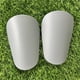 thumbnail image 3 of 1 par de mini espinilleras de fútbol resistentes al desgaste, protectores de piernas que absorben los golpes, livianos y portátiles, para entrenamiento de fútbol, 3 of 5