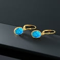 thumbnail image 4 of Gem Stone King 18K Yellow Gold Plated Silver Blue Simulated Opal Leverback Dangle Earrings for Women (1.12 Cttw, Gemstone October Birthstone, Oval Cabochon 9X7MM), 4 of 5