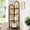 Black, variant on Leesinwing 4 Tier Corner Shelf, Pine Rattan Corner Bookshelf with Legs, 5.6 Feet Tall Corner Shelf, Minimalist Corner Shelves, Corner Shelves for Living Room, Bedroom, Bathroom, Black