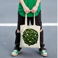 thumbnail image 4 of Stylish Canvas Tote Bag with Green Leaves & Fruits Design on Dark Background - Perfect Reusable Shopping Bag for Parties Travel & Everyday Use, 4 of 6