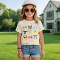 thumbnail image 2 of HCNTES Girls T Shirts Magical Bow Blouse Short Sleeve Loose Basic Shirt Girl Holiday Vacation Tee Tops(9-10 Years,Beige), 2 of 4