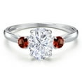 thumbnail image 3 of Gem Stone King 10K White Gold White Moissanite and Red Garnet 3-Stone Ring for Women | 1.80 Cttw | Oval 8X6MM | Gemstone Birthstone | Size 7, 3 of 6