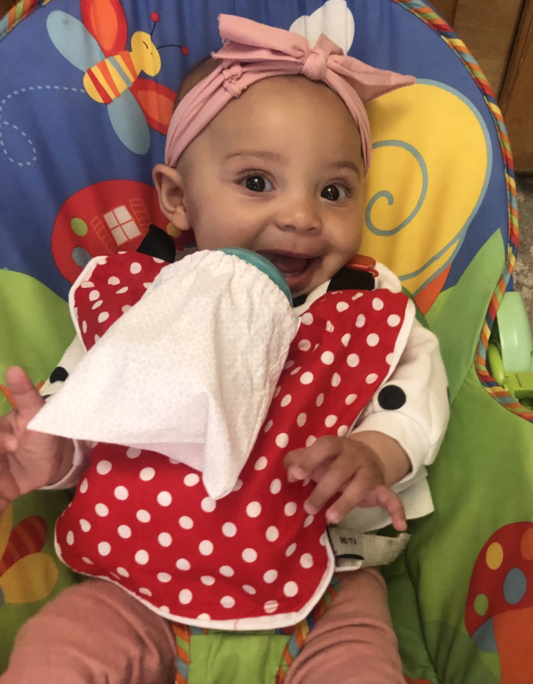 The Bottle Bib -Hands Free Feeding.  Accelerate Baby's Feeding Independence.  Keep Baby  Bottles, Food Pouches and Training Cups, From Falling Onto Dirty Surfaces!  Unisex Patterned Baby Feeding Bib.