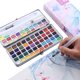 thumbnail image 2 of Juego de pintura de acuarela sólida de 72 colores con 3 pinceles, estuche de metal portátil para profesionales principiantes, herramienta de pintura artística para estudiantes Feliz Sencillez, 2 of 5