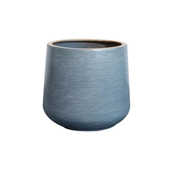 Maceta redonda de cerámica con orificios de drenaje for interior y exterior.