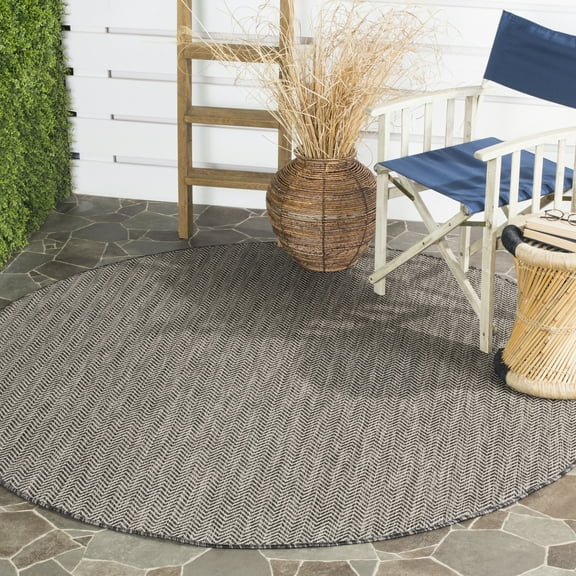 SAFAVIEH Courtyard Morven Chevron Stripes Indoor/Outdoor Area Rug, 5'3" x 5'3" Round, Black/Beige