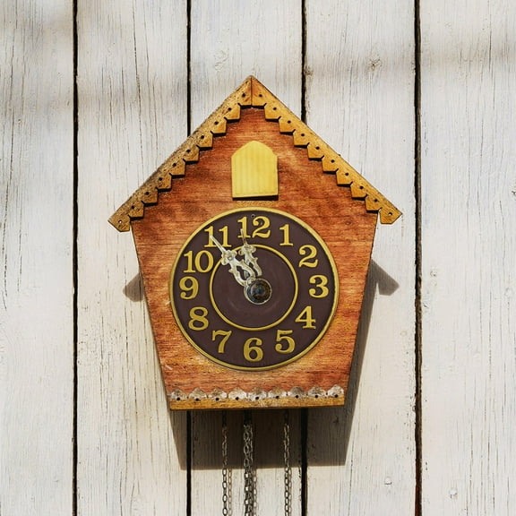 NIAIZEK Golden Cuckoo Quartz Wall Clock with Roman Numerals and Artful Design