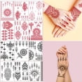 thumbnail image 1 of Adhesivos temporales para tatuajes con henna, 12 hojas, rojo y negro, 1 of 6
