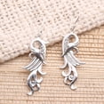 thumbnail image 2 of NOVICA Handmade .925 Sterling Silver Dangle Earrings Mythical Bird No Stone Indonesia Animal Themed [2 in L x 0.6 in W x 0 in D] 'Mythical Bird', 2 of 8