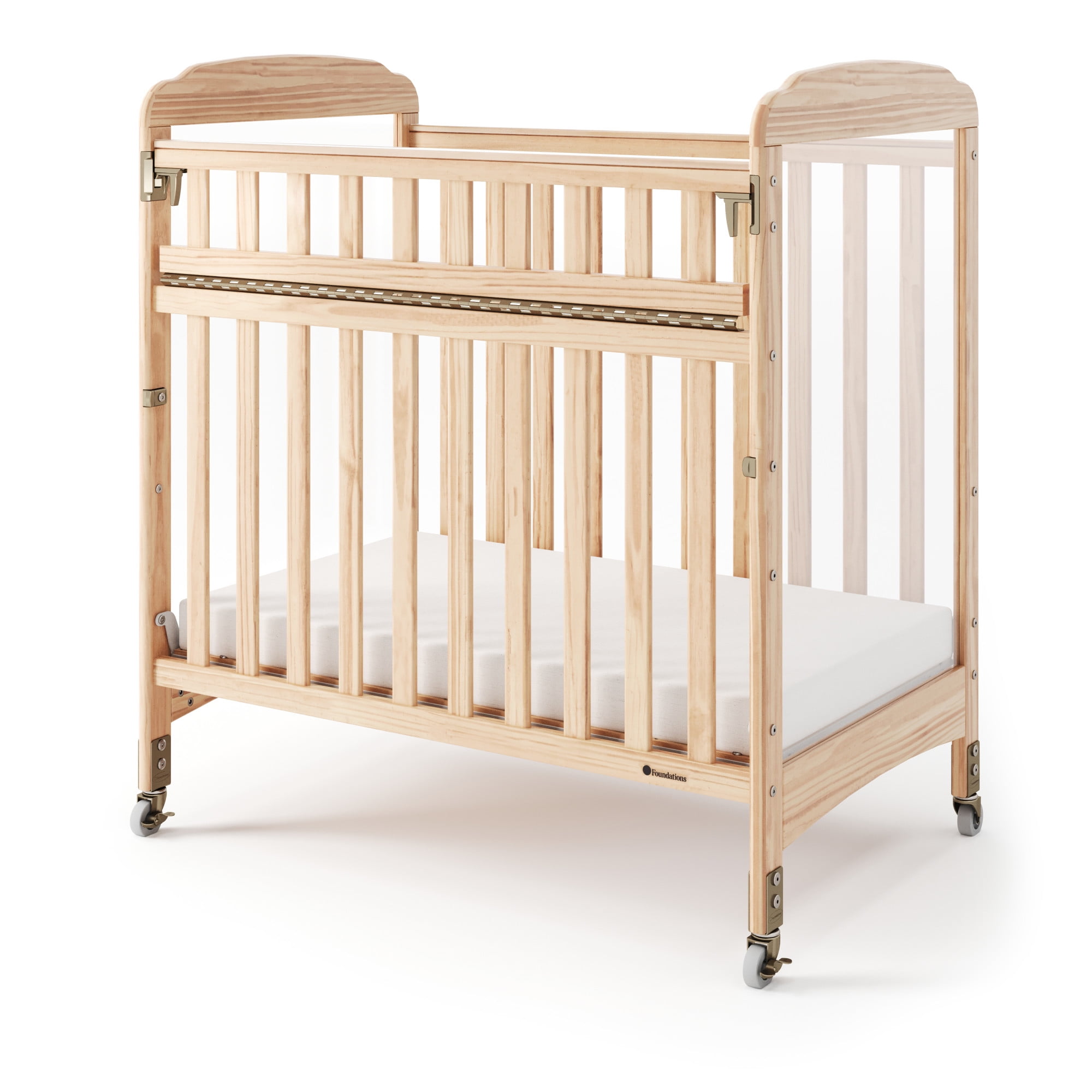 Foundations Serenity SafeReach Compact Wooden Crib with Commercial Grade Casters, Clear End Panels for Child Visibility, Includes 3” Foam Mattress (Natural)