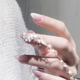 thumbnail image 3 of Pulsera larga HUOGUO de uñas postizas con forma de estrella lunar, color nude, 24 unidades, 3 of 4