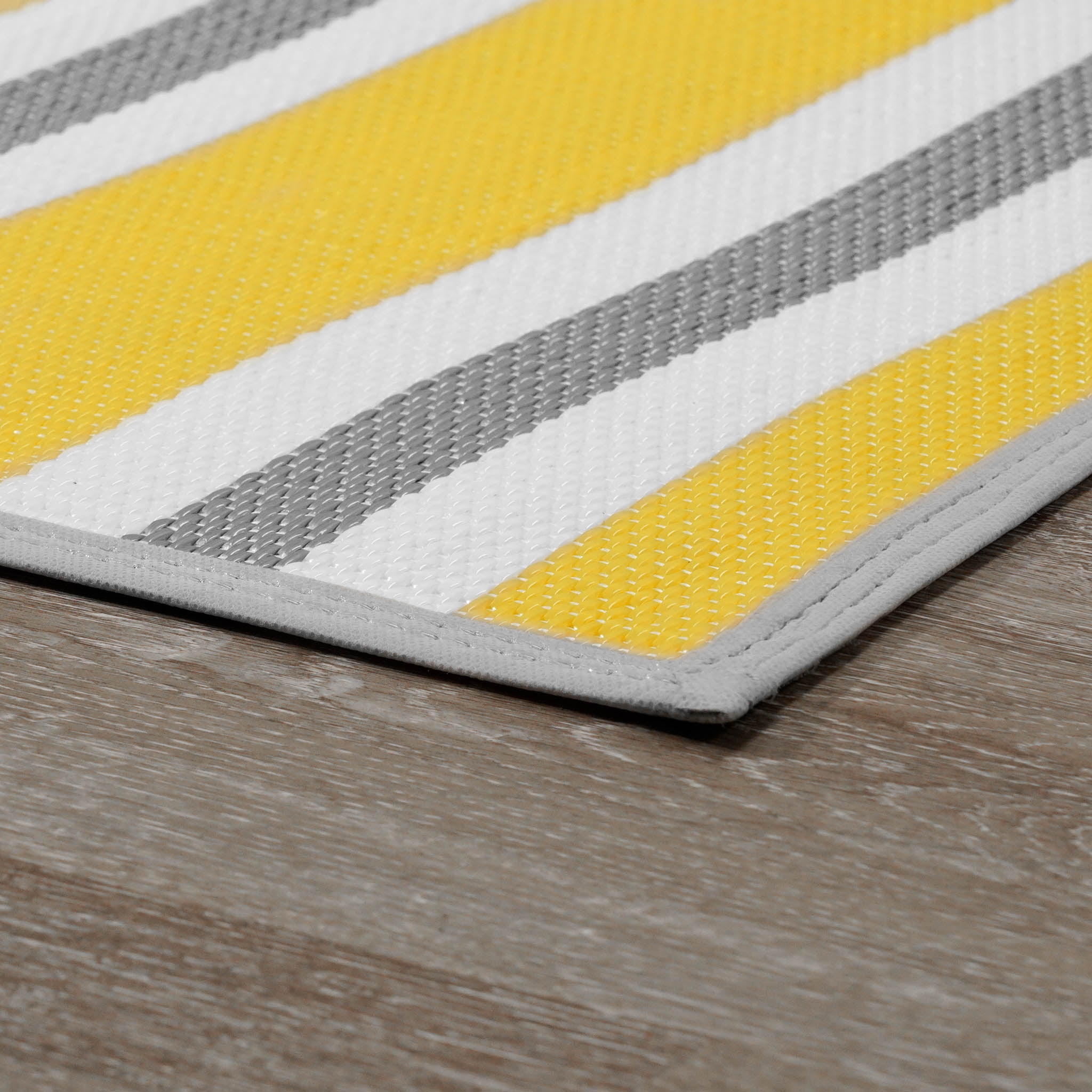 Luna Contemporary Stripe Yellow and Gray Polypropylene Reversible Plastic Straw Outdoor Area Rug, 4' x 5'11'' Rectangle