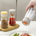 thumbnail image 1 of Frasco de vidrio para especias con agitador | Diseño de doble sello a prueba de fugas | Dispensador cuantitativo de condimentos | Almacenamiento de alimentos transparente | Fácil vertido | 5.4 x 2.7, 1 of 6