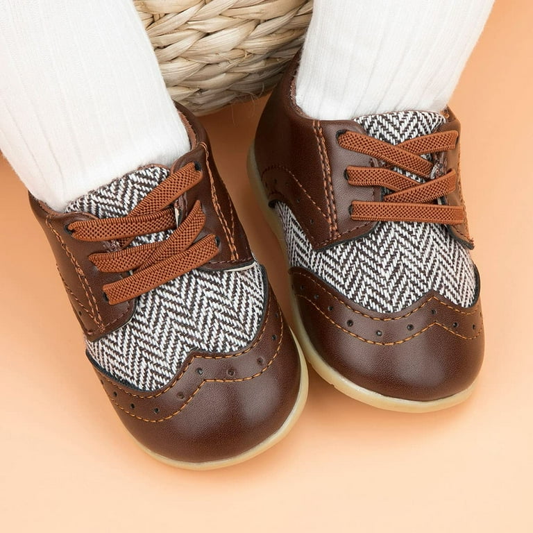 Infant boy deals dress shoes