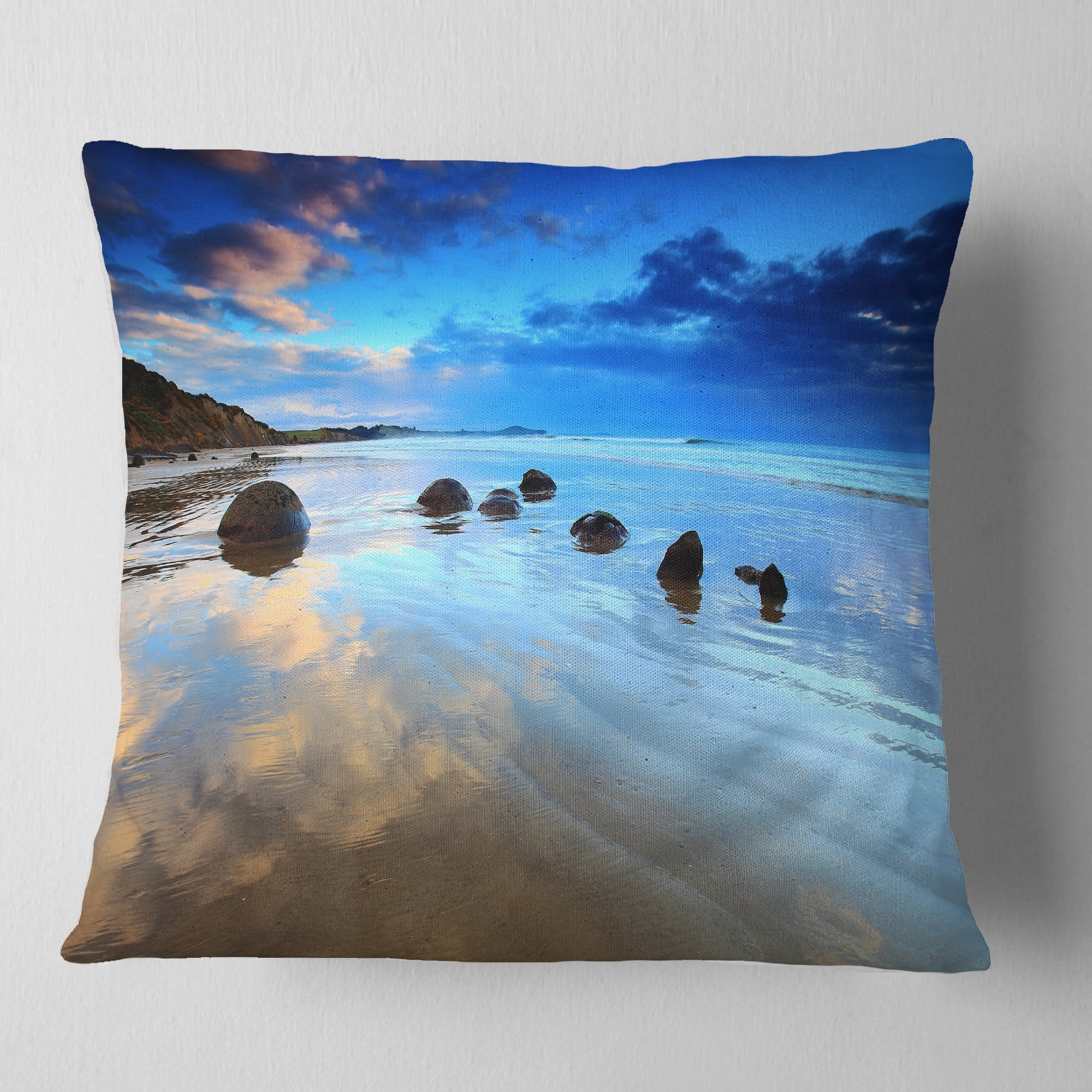 Designart Cloudy Sky Over Moeraki Boulders - Seashore Photo Throw Pillow - 18x18