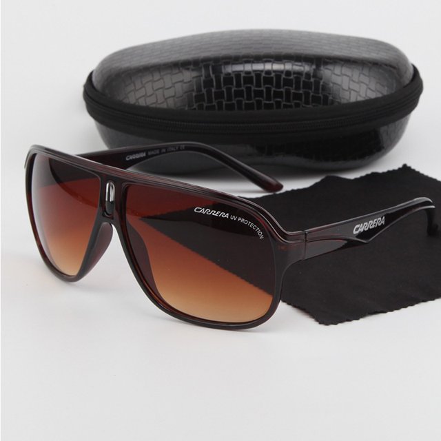 gafas de sol carrera de nueva moda para hombres con estuche de pu marco grande conducción hombre mujer deportes al aire libre gafas piloto con montura marrón translúcida y lentes degradadas marrón, logo CARRERA en la varilla; incluye funda rígida de PU texturizada y paño de limpieza; vista frontal 3/4 sobre fondo blanco.