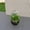 Black, variant on LeisureMod Iris Mid-Century Modern Fiberstone and Clay Planter - Round Plant Pot with Drainage Holes for Indoor and Outdoor (Black, 7" Height)