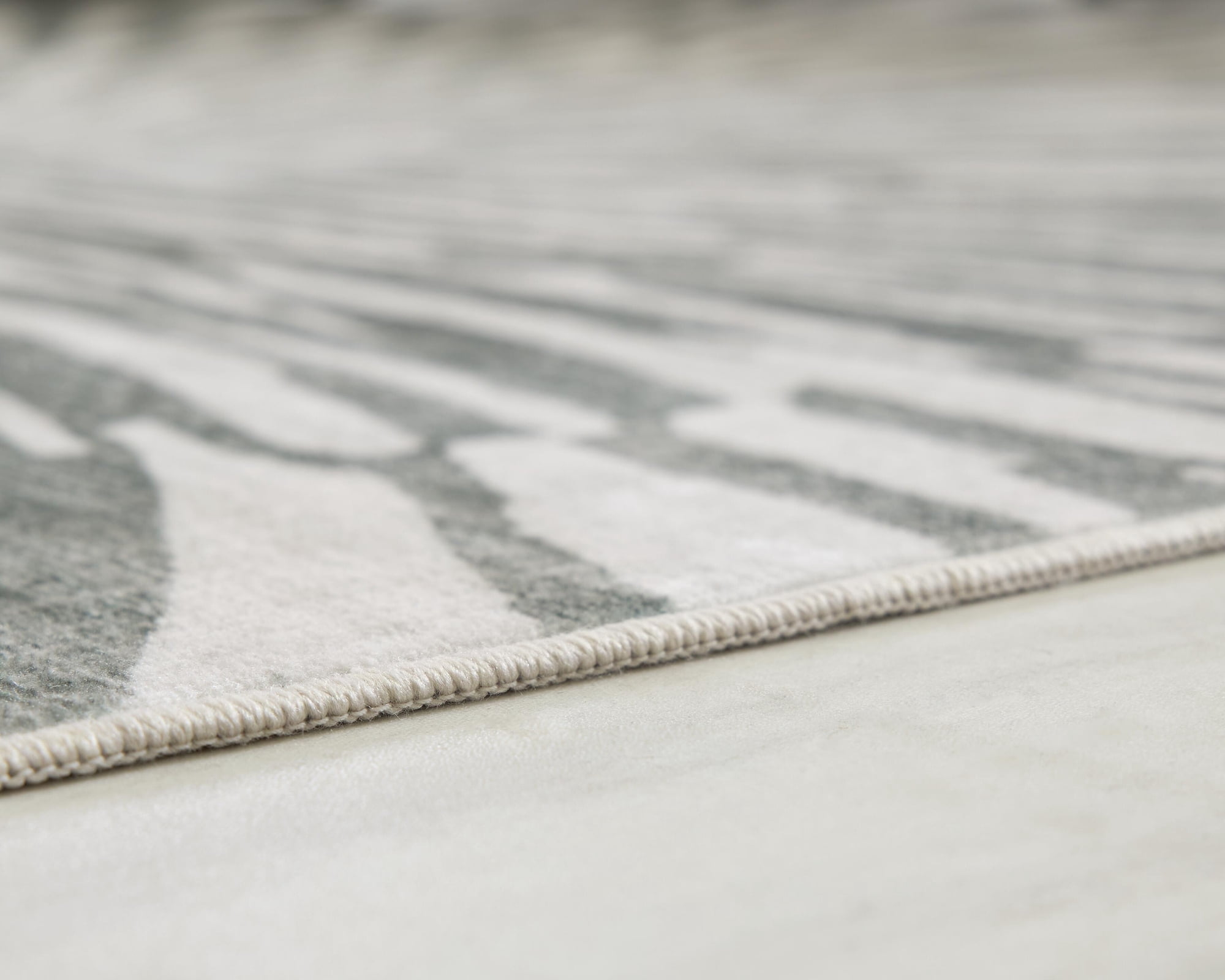 Signature Design by Ashley Verland 5' x 7' Washable Area Rug, Gray/White Sunburst Faux Fur Rug
