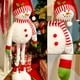 thumbnail image 4 of Figura de Muñeco de Nieve Navideño con Gorro Rojo de Papá Noel | Postura Ajustable | Decoración Festiva | Excelente Idea de Regalo de Navidad, 4 of 4