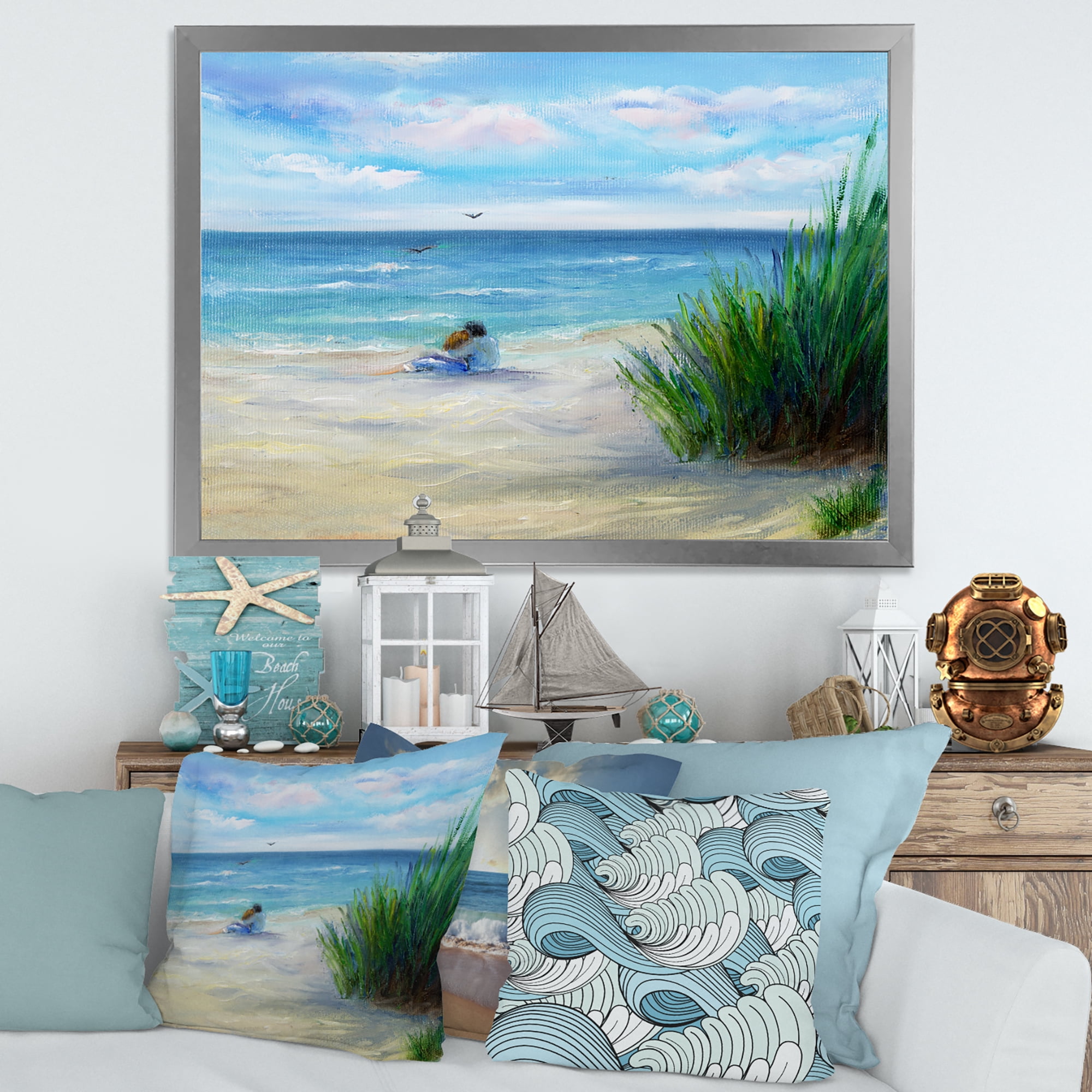 Designart 'Couple Sitting In Love By The Beach' Nautical & Coastal Framed Art Print