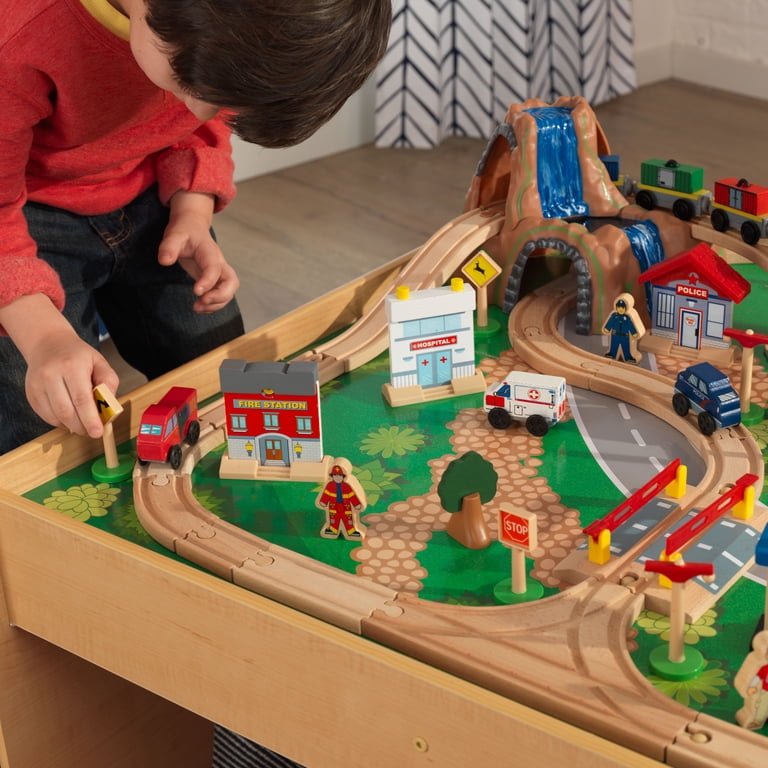 KidKraft Juego de Tren y Mesa de Madera Waterfall Junction con Cajas de Almacenamiento, Circuito de ferroviarias con Coches, helicóptero y avión de Juguete niños 3 años (17498