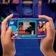 thumbnail image 3 of DREAMGEAR CONSOLA PORTÁTIL MEGA MAN POCKET PLAYER PRO CON PANTALLA DE 7 CM, ESTUCHE DE VIAJE Y 6 JUEGOS INCLUIDOS, 3 of 3