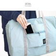 thumbnail image 2 of Injueey Bolsa de viaje impermeable de nailon, bolsa de lona plegable Unisex, organizadores, cubos de embalaje de gran capacidad, bolsas de Almacenamiento y organización del hogar azul claro, 2 of 6