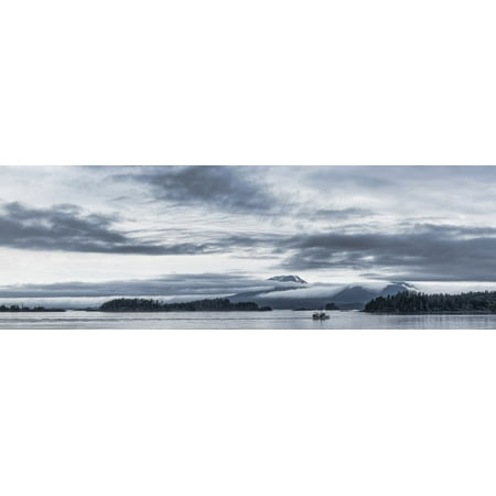 Fishing boat in ocean with Reddit Volcano in the background, Sitka, Southeast Alaska, Alaska, USA Poster Print