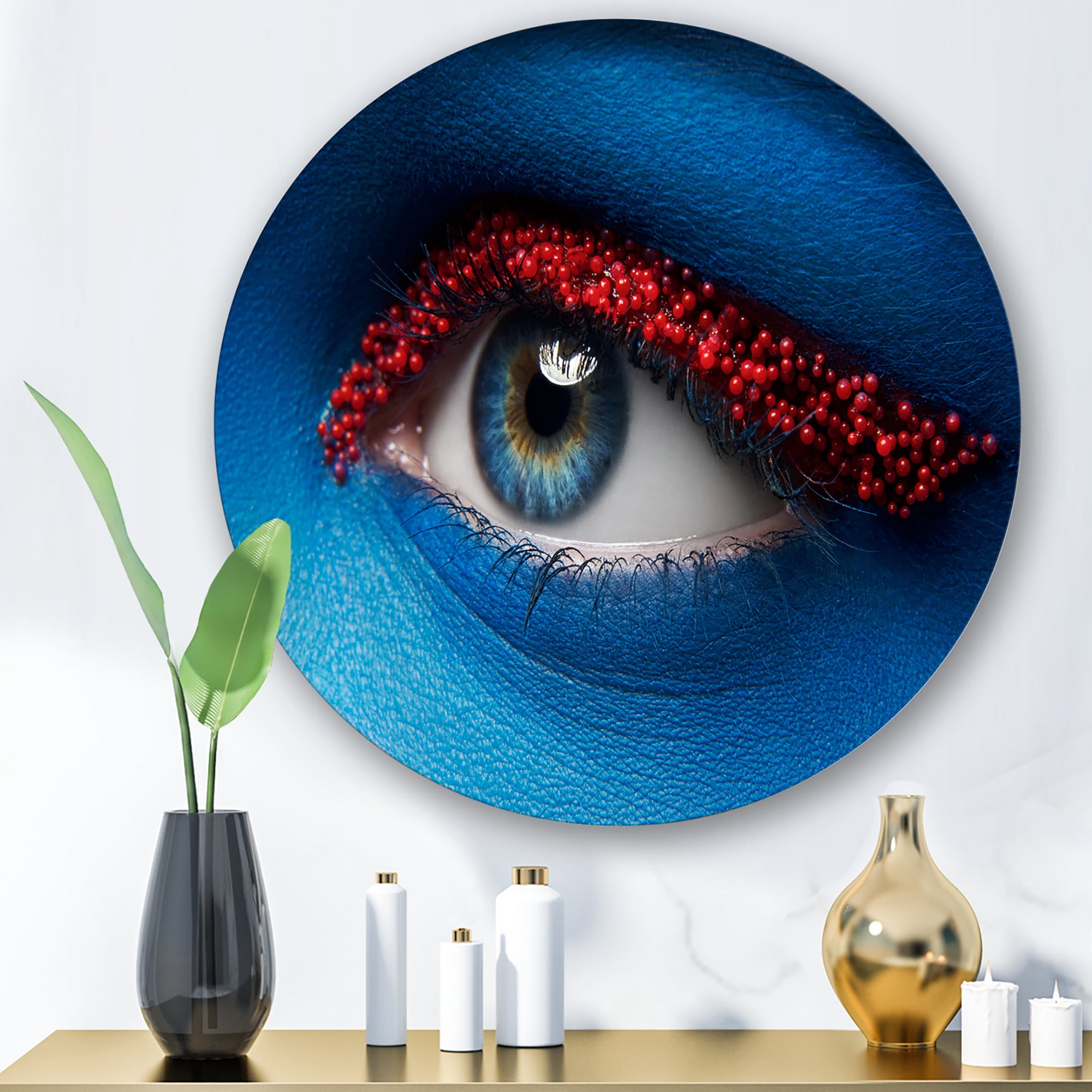 Designart 'Woman Eye With Blue Paint On Face & Red Balls' Modern Circle Metal Wall Art 23x23 - Disc of 23