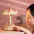thumbnail image 1 of Kit de caja de música de madera con rompecabezas 3D con LED, kit de modelo mecánico giratorio de paseo en columpio, kit de pasatiempos para manualidades en madera para adultos, cumpleaños pa, 1 of 5