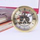 thumbnail image 3 of Reloj de pared de metal de 3,8" con perspectiva clásica y cuarzo a pilas. dorado, 3 of 9