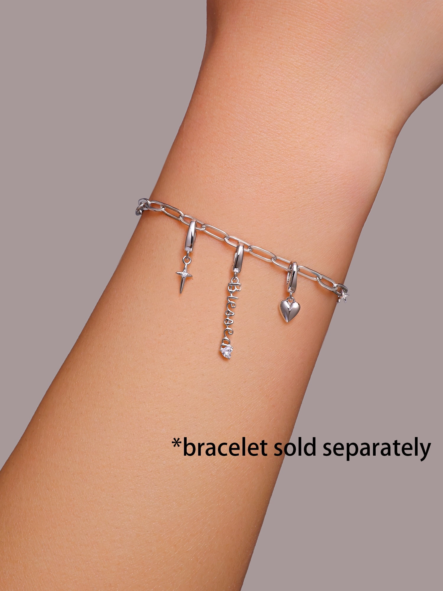 Brilliance Fine Jewelry Simulated Diamonds Blessed Charm Set in Sterling Silver