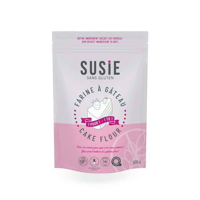 Susie Gluten Free - Cake Flour, 500g, packaged in a resealable pink and white pouch. The design includes the Susie Sans Gluten logo, a cake illustration, and certifications for gluten-free, soy-free, plant-based, and Kosher. Ideal for 1-to-1 substitution in baking recipes.