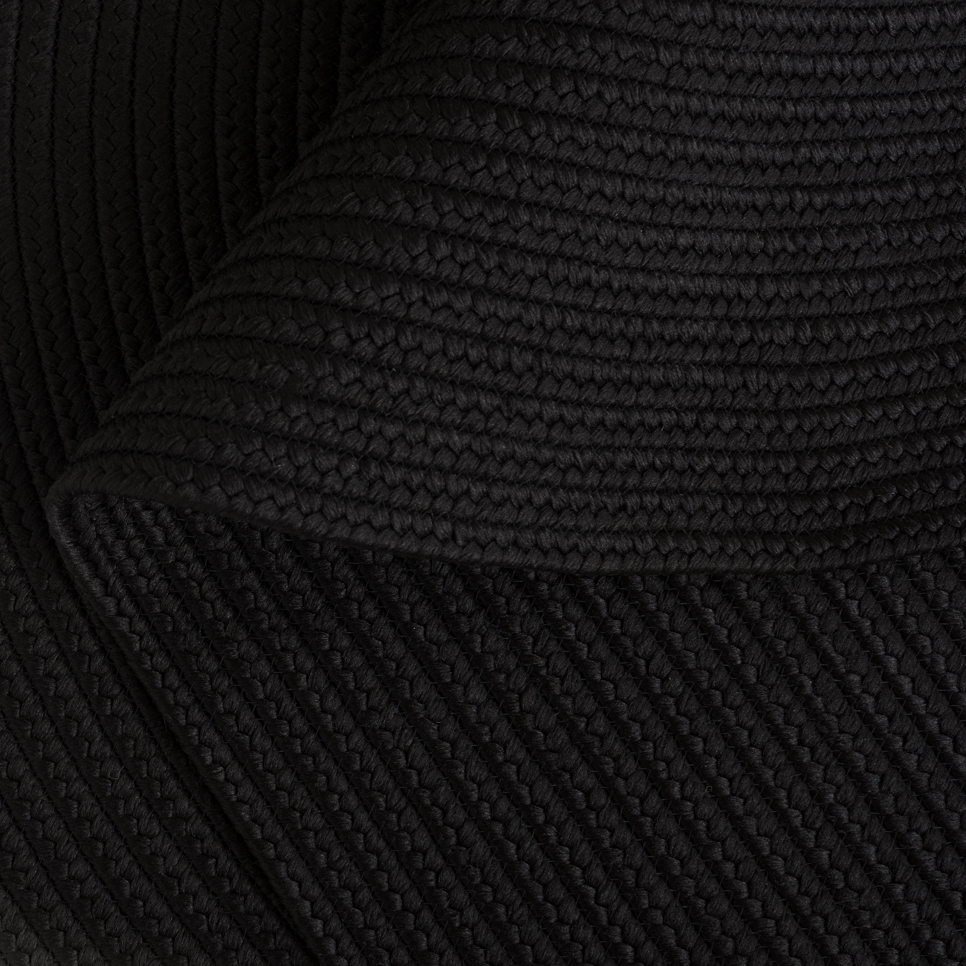 SAFAVIEH Braided Rishika Solid Machine Washable Reversible Area Rug, Black, 5' x 8' Oval