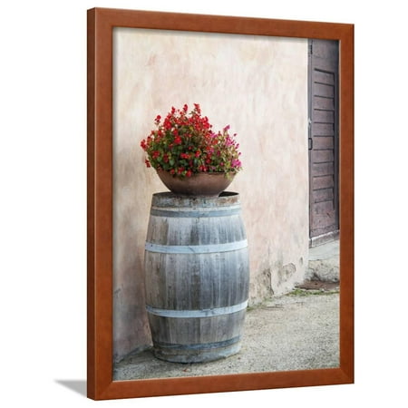 Europe, Italy, Tuscany. Flower Pot on Old Wine Barrel at Winery Framed Print Wall Art By Julie